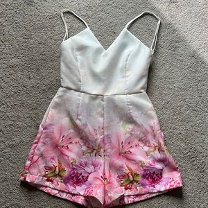 White and pink floral romper from an Australian boutique